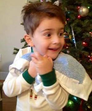 Little boy and blue blanket